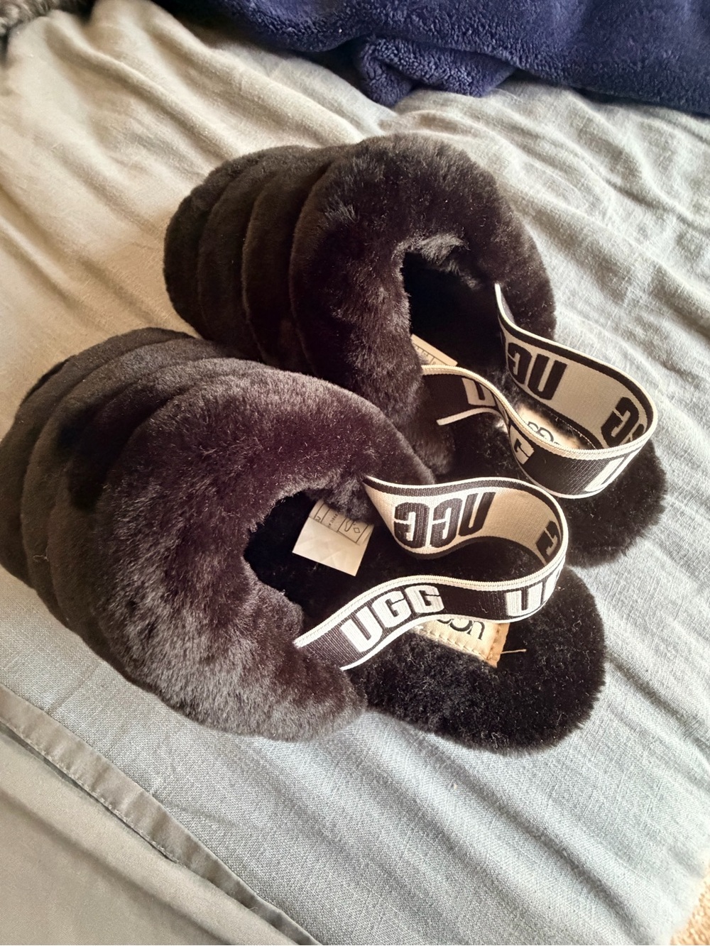 UGG Black Plush Shearling Slide with Logo Strap